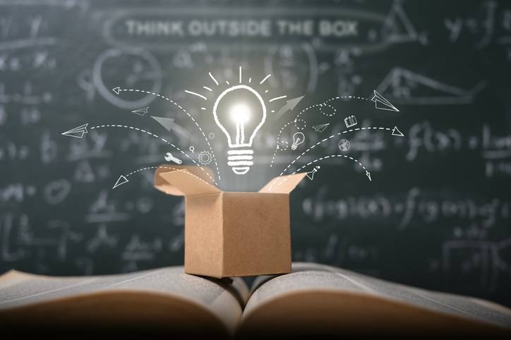 think outside the box on school green blackboard . startup education concept. creative idea. leadership.