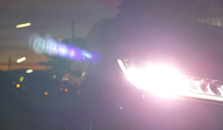 Car headlights with a high beam could cause trouble to opposing traffic.