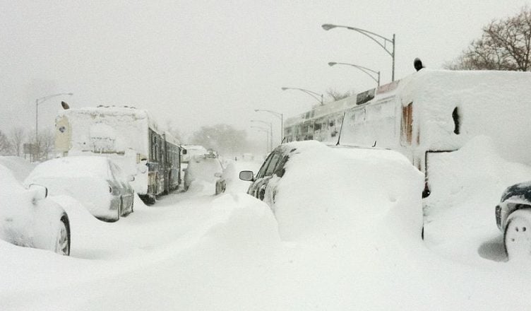 Cars and trucks stuck in snow