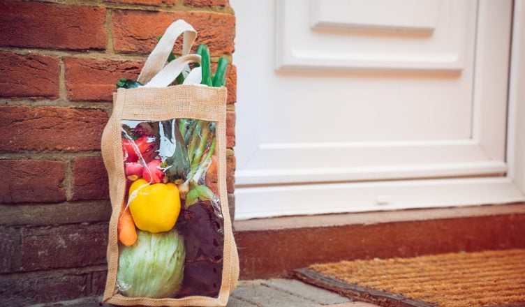 Groceries delivered at customer's door by the farm to door delivery service providers