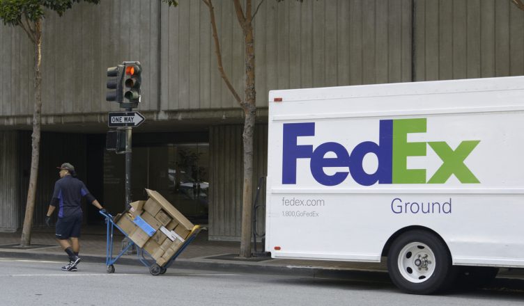 A FedEx delivery driver delivers packages in San Francisco. FedEx Ground, formerly known as RPS, is a delivery service and a subsidiary of FedEx Corporation.