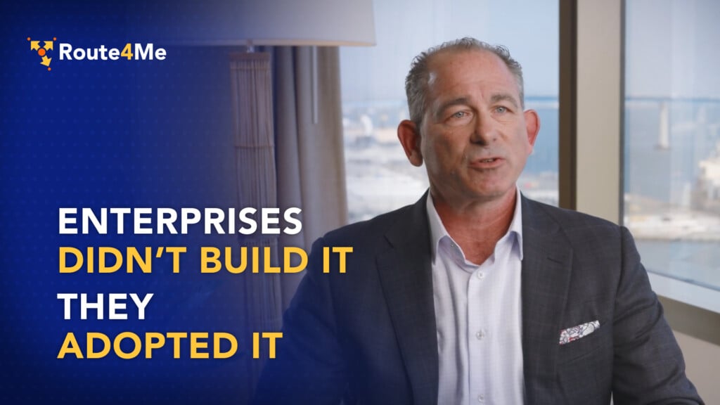 Josh Haims shares how Route4Me grew from SMB to enterprise adoption, seated in office with city view behind him