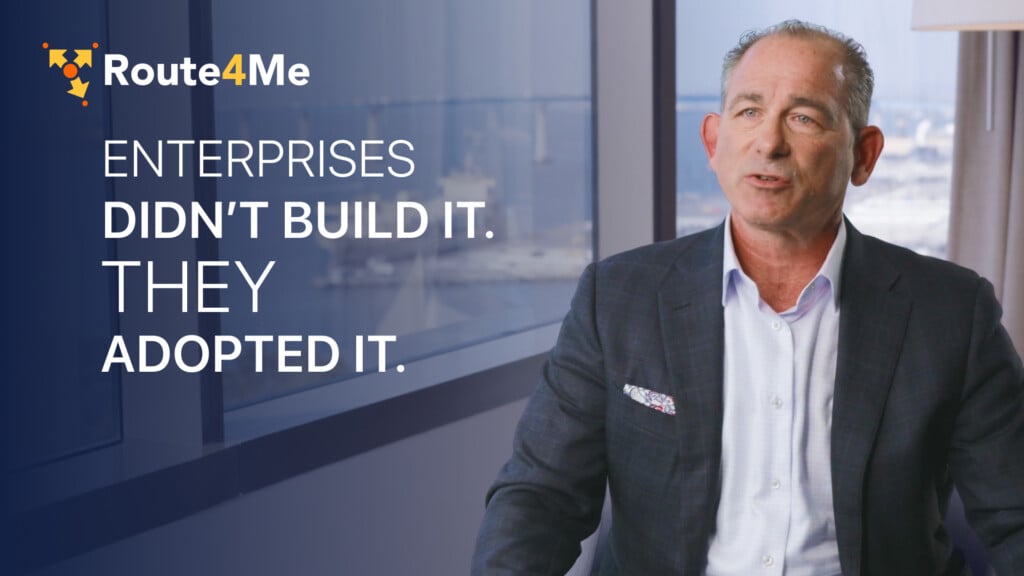 Josh Haims shares how Route4Me grew from SMB to enterprise adoption, seated in office with city view behind him