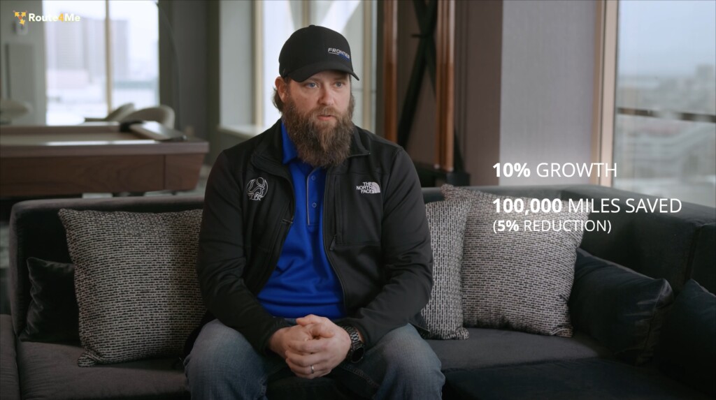 Frontier employee in a Route4Me video testimonial highlighting 10% growth and 100,000 miles saved.